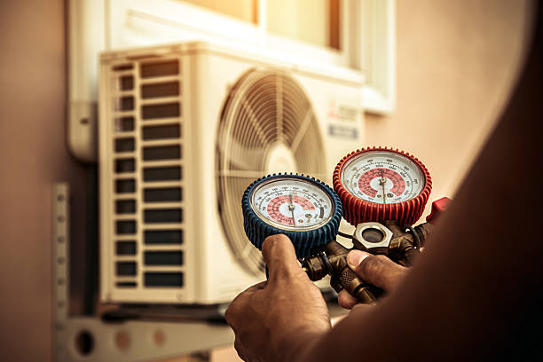 Professional Air Conditioning Service technician working in Siler City, NC